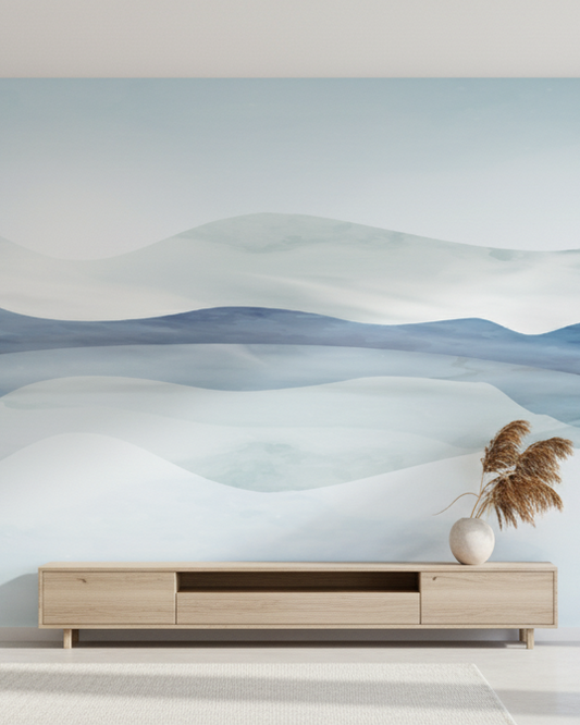 Modern living room with a large abstract wall mural of mountains.