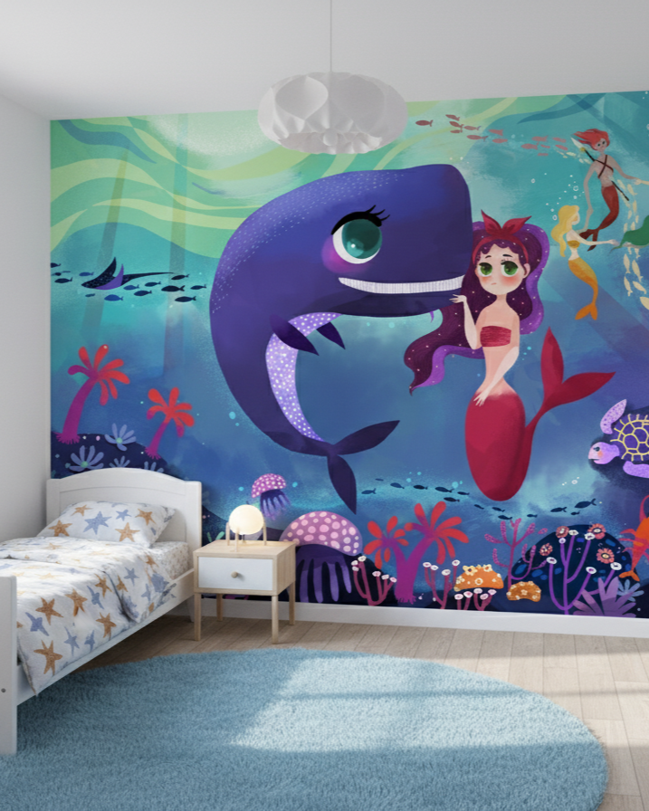 Children's bedroom with an underwater-themed wall mural featuring a mermaid and whale.