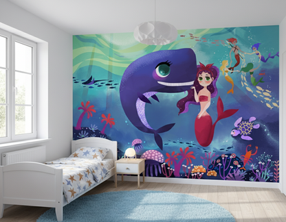 Children's bedroom with an underwater-themed wall mural featuring a mermaid and whale.