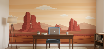 Room interior with a desk and wall mural of a desert landscape with red rock formations.