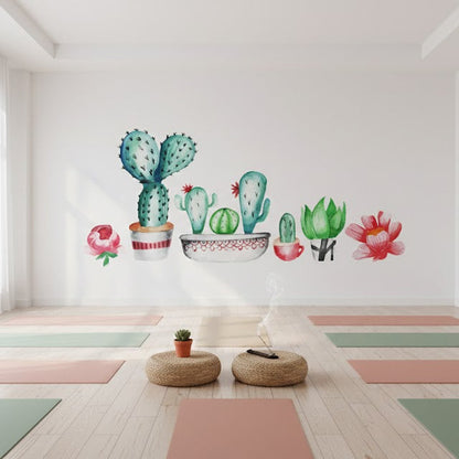 Yoga studio with colorful cactus wall decals on a white wall.