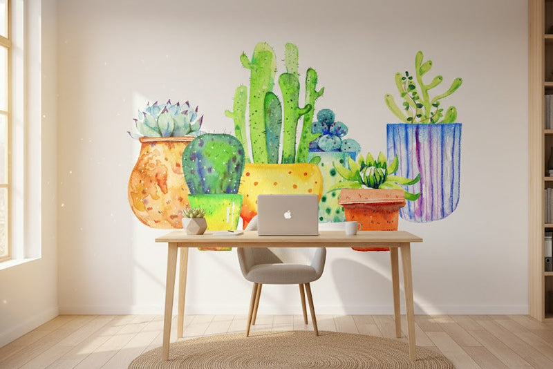 Colorful cactus wall decals in a home office setting with a desk and laptop.